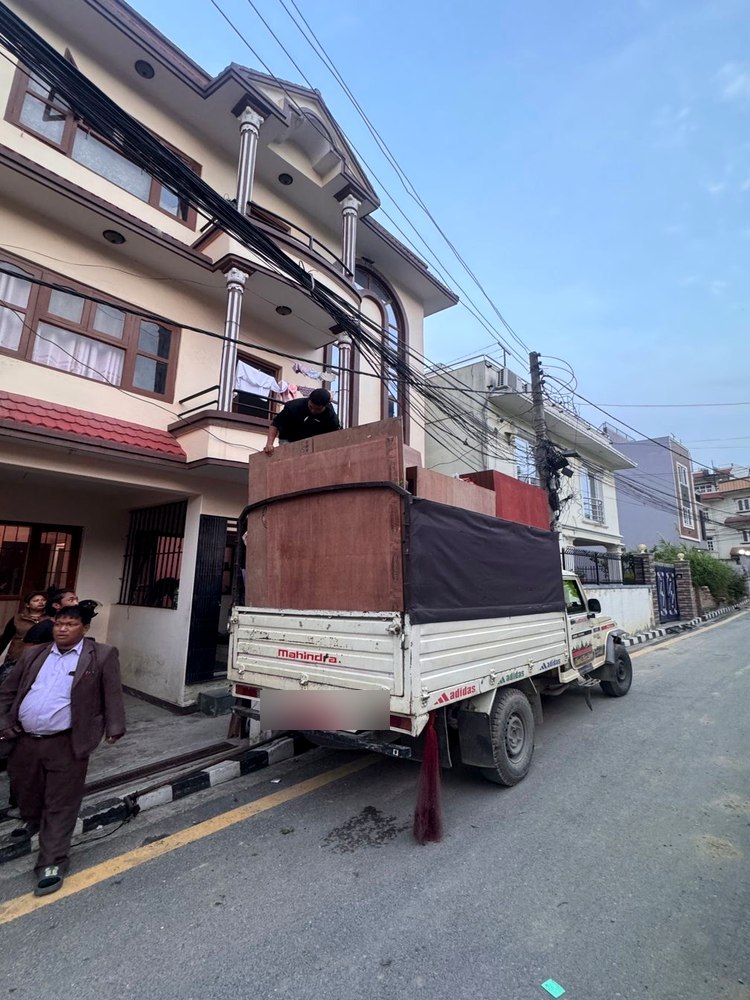 Furniture loading at a multi-story house in Kathmandu