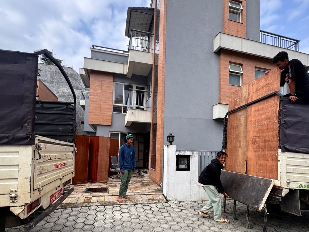 Furniture transport job at multi-story building